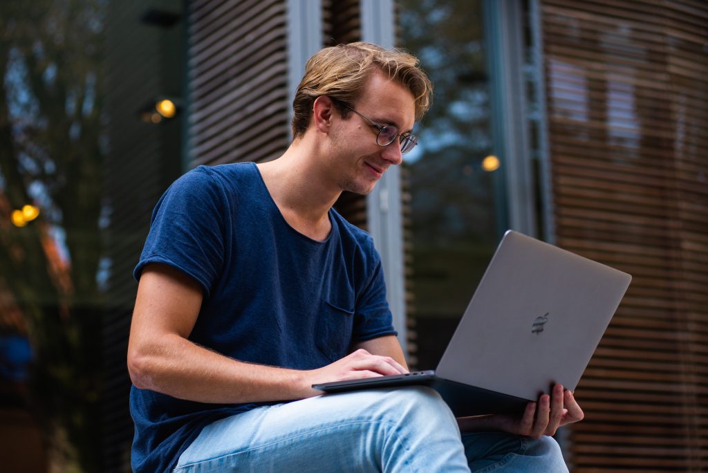 a man on a computer