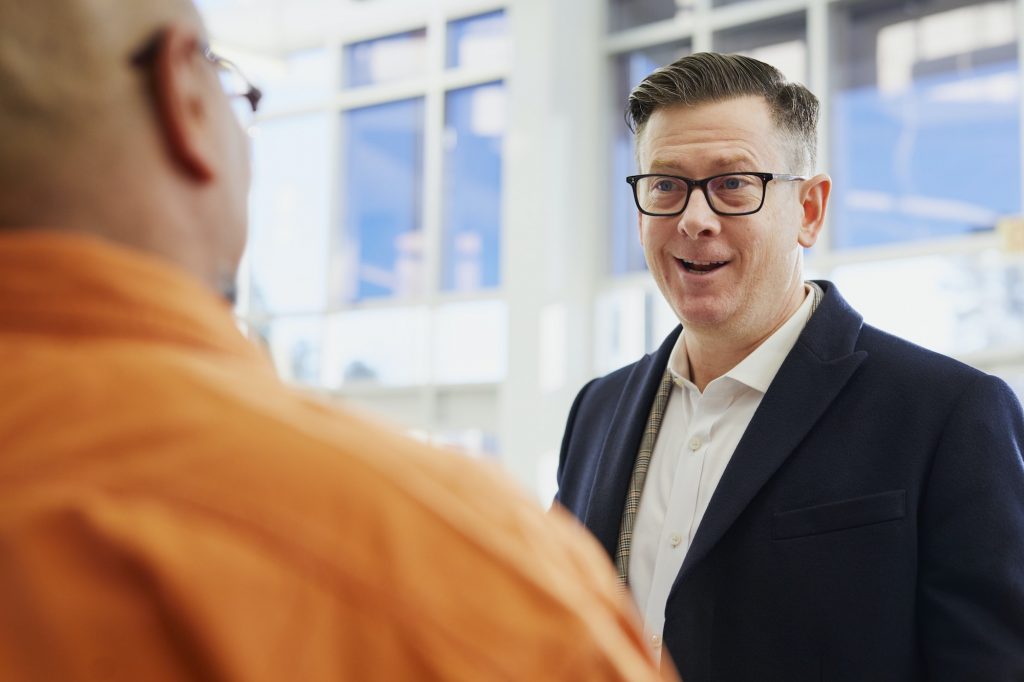 two employees having a conversation