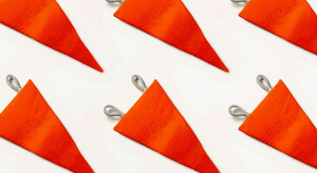 a pattern of red flags against a white background