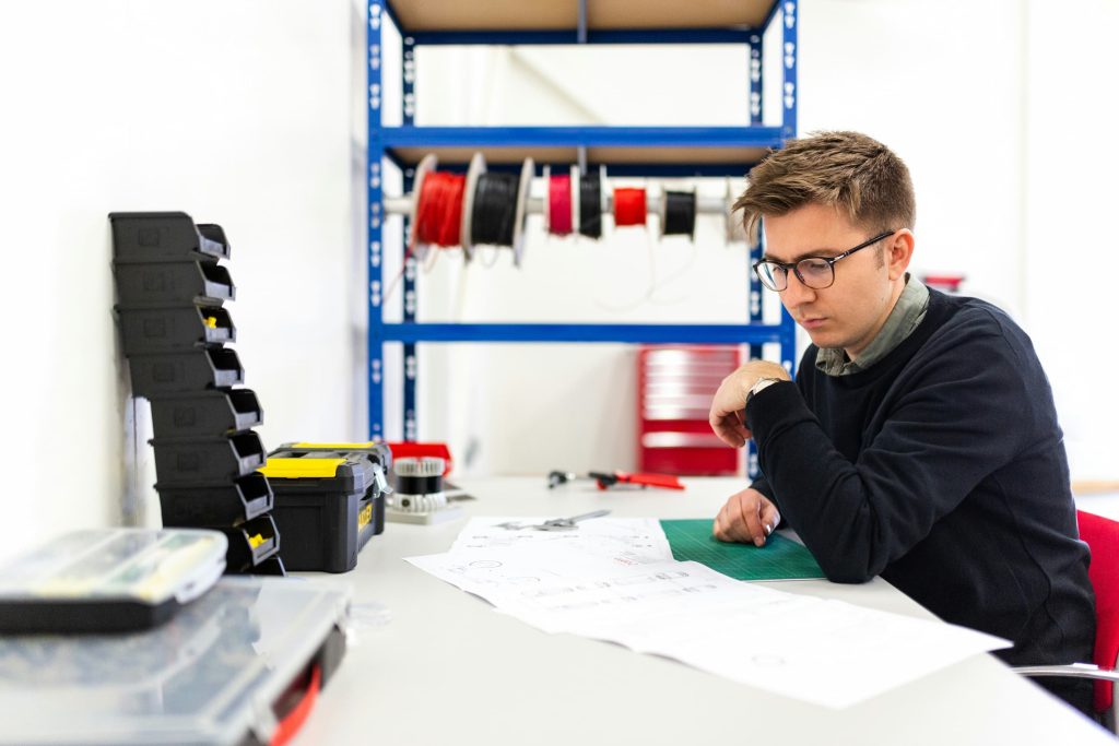 engineer looking at a CAD drawing